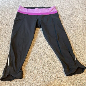 Lululemon Cropped Running Tights with reflective stripes, Size 8